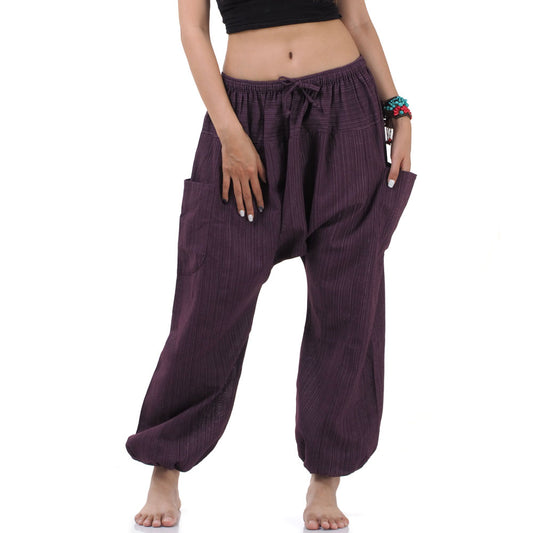 Close-up of the Purple Orchid pinstripe harem pants, showing the handcrafted 100% natural cotton texture and fine stripes.