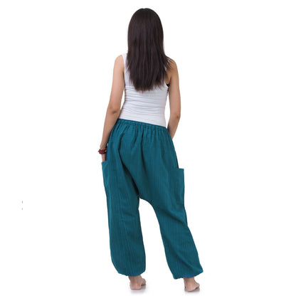 Rear view of the Turquoise Bay harem pants, highlighting the generous cut and freedom of movement.