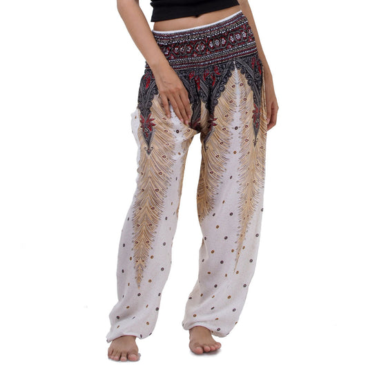 Close-up of white Thai harem yoga pants with peacock print
