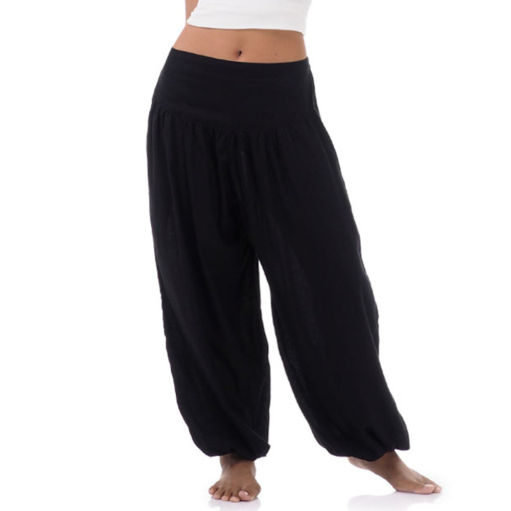 Detail of midnight black Thai harem pants, handmade nature-inspired sophistication.