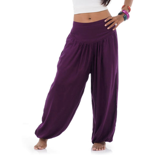 Close-up purple orchid Thai harem pants, handmade nature-inspired color.
