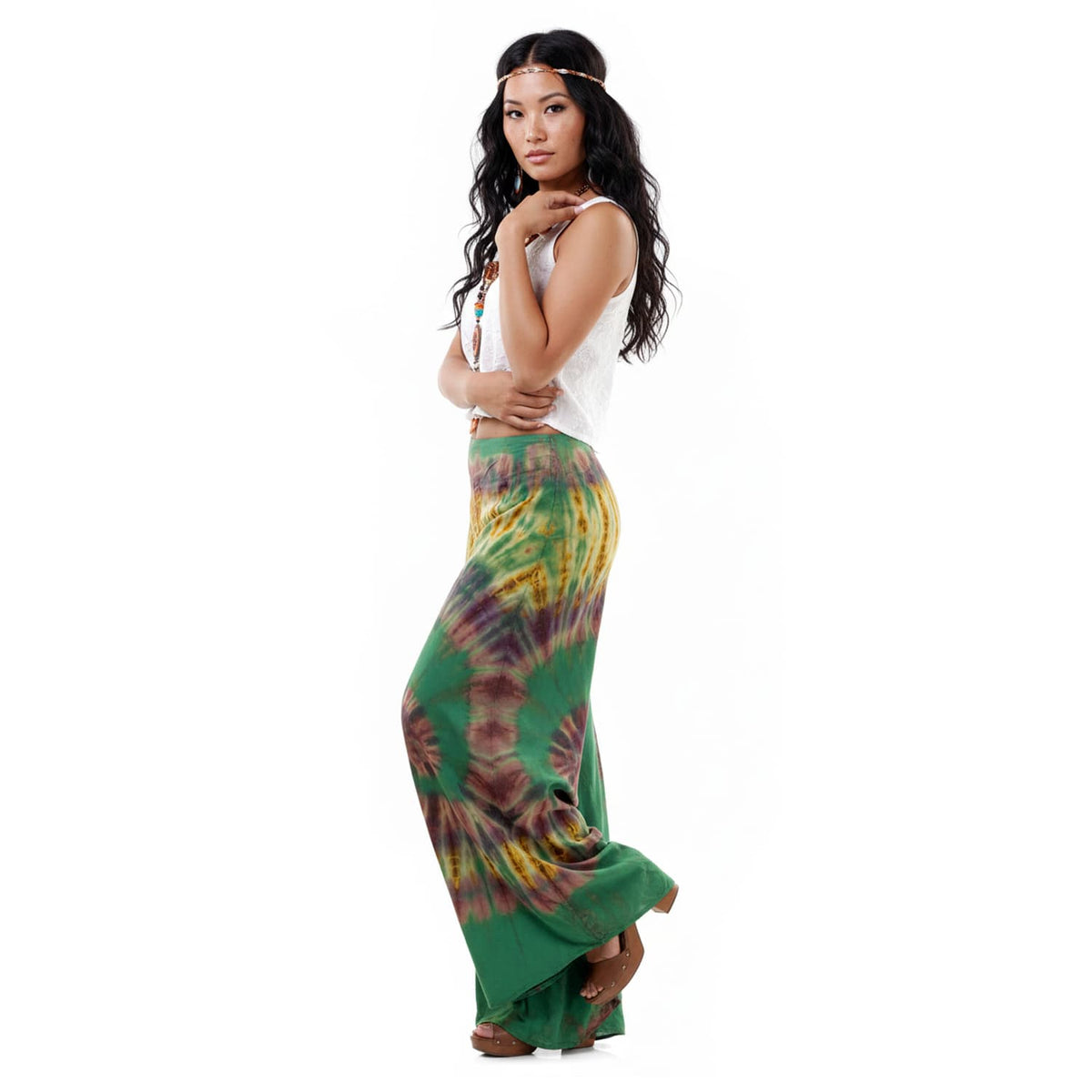 Side profile of the Emerald Oasis Hippie Tie Dye Palazzo Pants on a female model, displaying the airy and flowing design.
