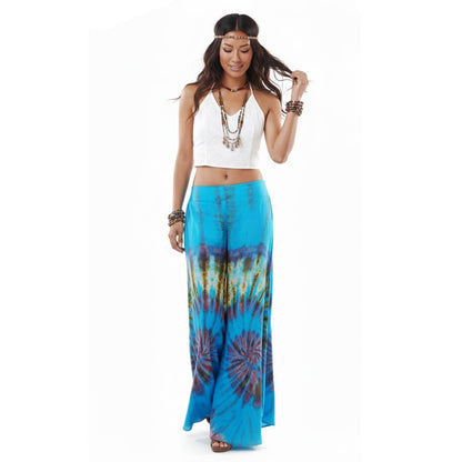 Front view of the Ocean Blue Hippie Tie Dye Palazzo Pants on a female model, presenting a chic and casual beach look.