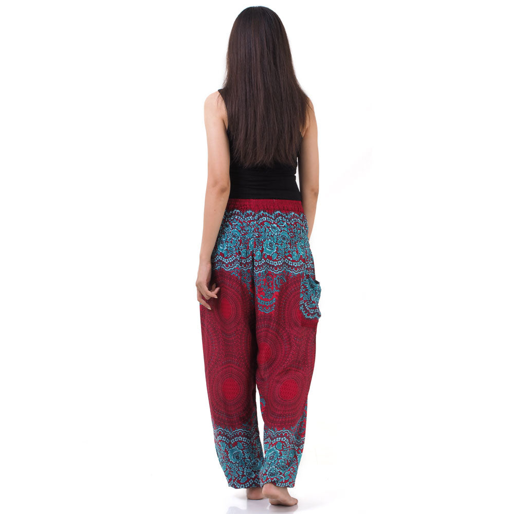 Back view of red Thai harem yoga pants with mandala print worn with black top