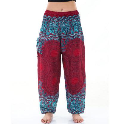 Close-up of red Thai harem yoga pants with mandala print