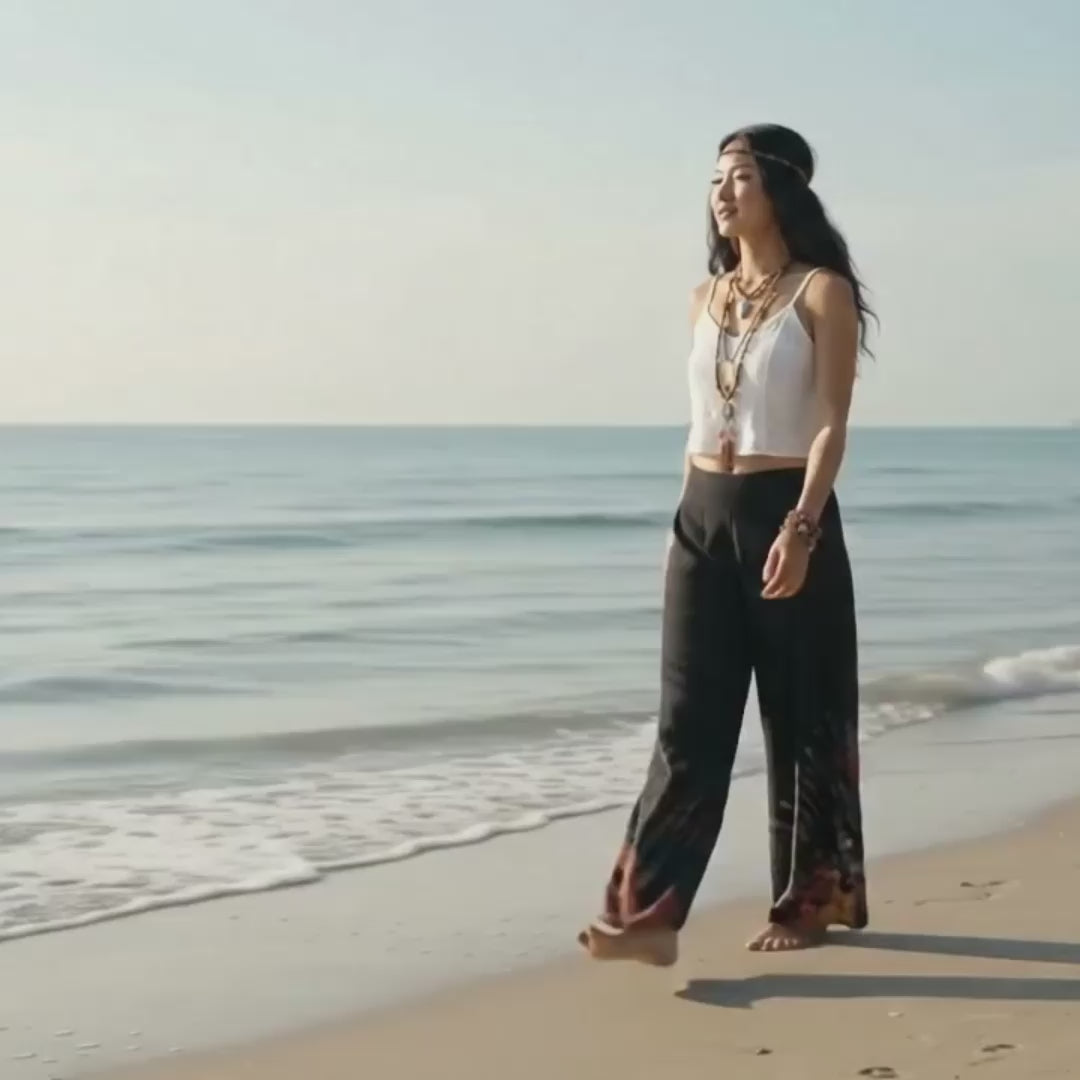 Video: Female model strolling on the sand at a Thai beach in the airy Midnight Magic Hippie Tie Dye Palazzo Pants.