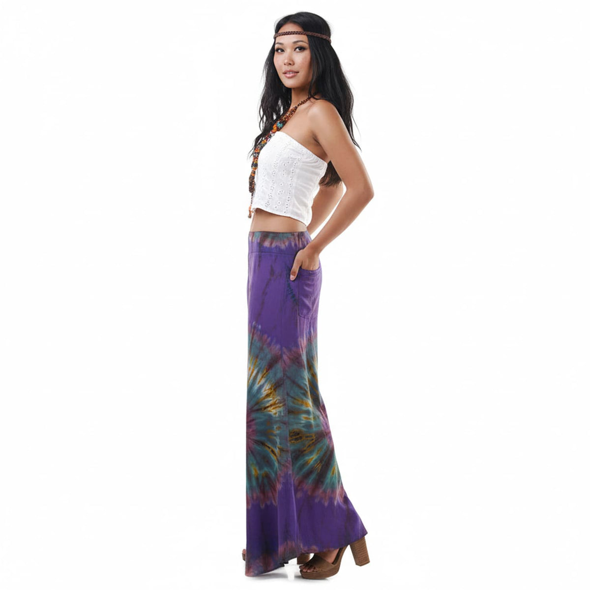 Side profile of the Royal Purple Hippie Tie Dye Palazzo Pants on a female model, showing the generous flared palazzo silhouette.