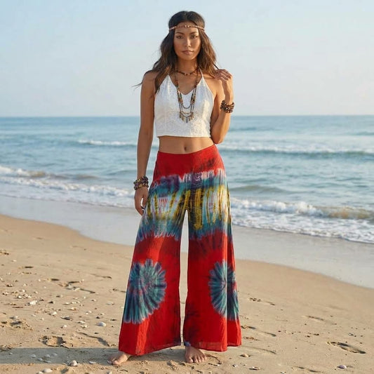 Close-up texture of the Crimson Sunset Hippie Tie Dye Palazzo Pants, displaying the vivid red and earthy tie-dye color gradient.
