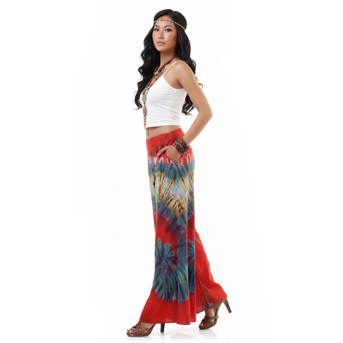 Side view of the Crimson Sunset Hippie Tie Dye Palazzo Pants on a female model, emphasizing the flowy motion and boho silhouette.