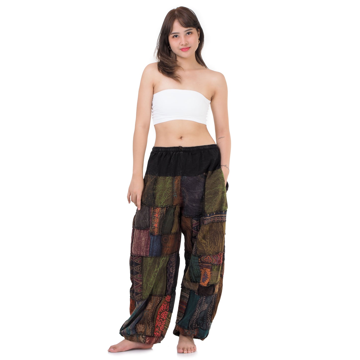 Front view of female model wearing brown Thai patchwork harem pants