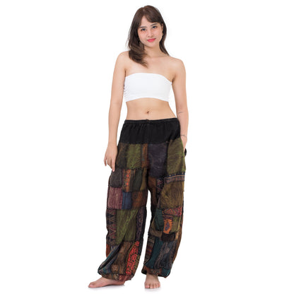Front view of female model wearing brown Thai patchwork harem pants